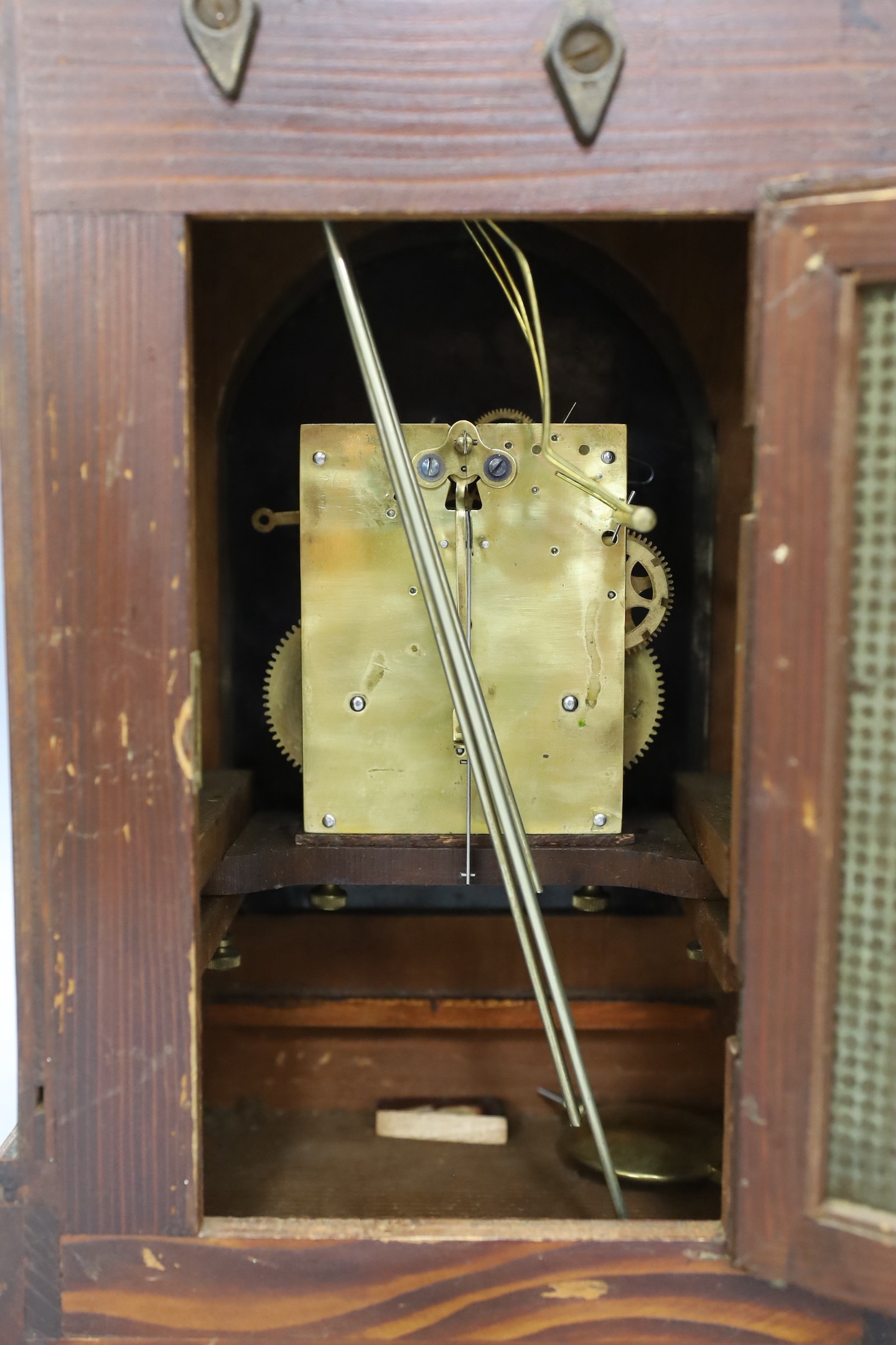 A late 19th century rosewood and marquetry mantel clock, 36 cms high.